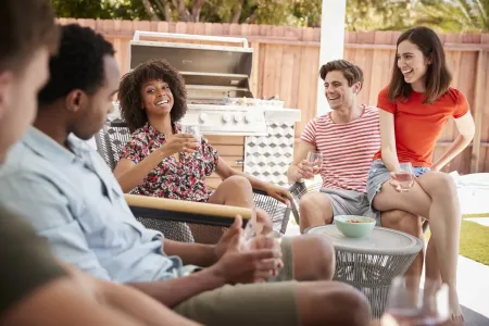 friends outside near grill